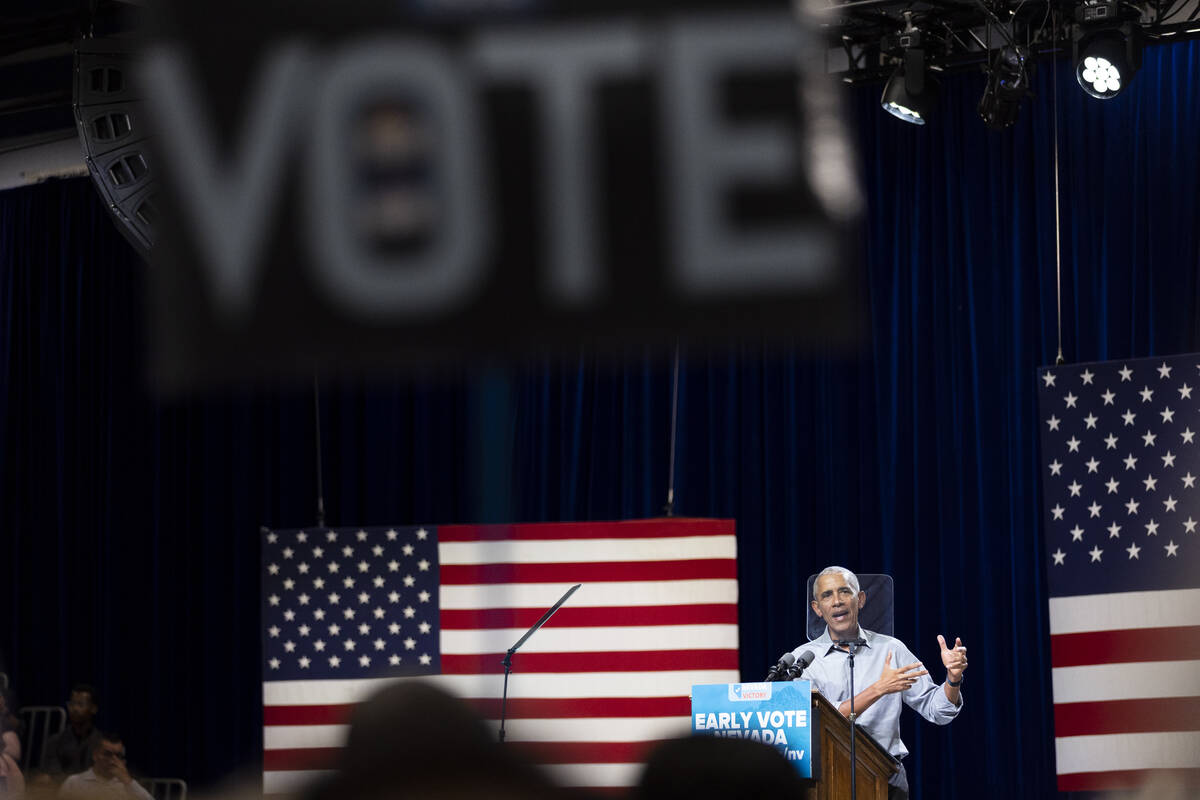 Former President Barack Obama speaks during a campaign rally organized by Nevada Democratic Vic ...