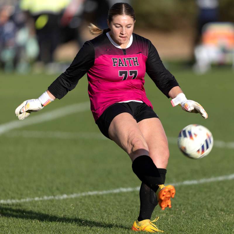 Faith Lutheran’s goalkeeper Elke Travis (77) kicks the ball into play during a Class 5A ...