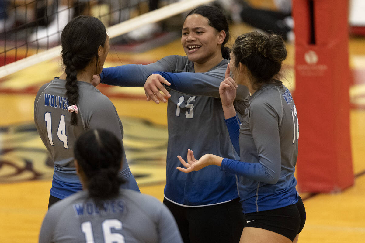 Basic’s Taylah Paepule (14), Daryn Faumui (15) and Annamaria Ramos (12) celebrate a poin ...