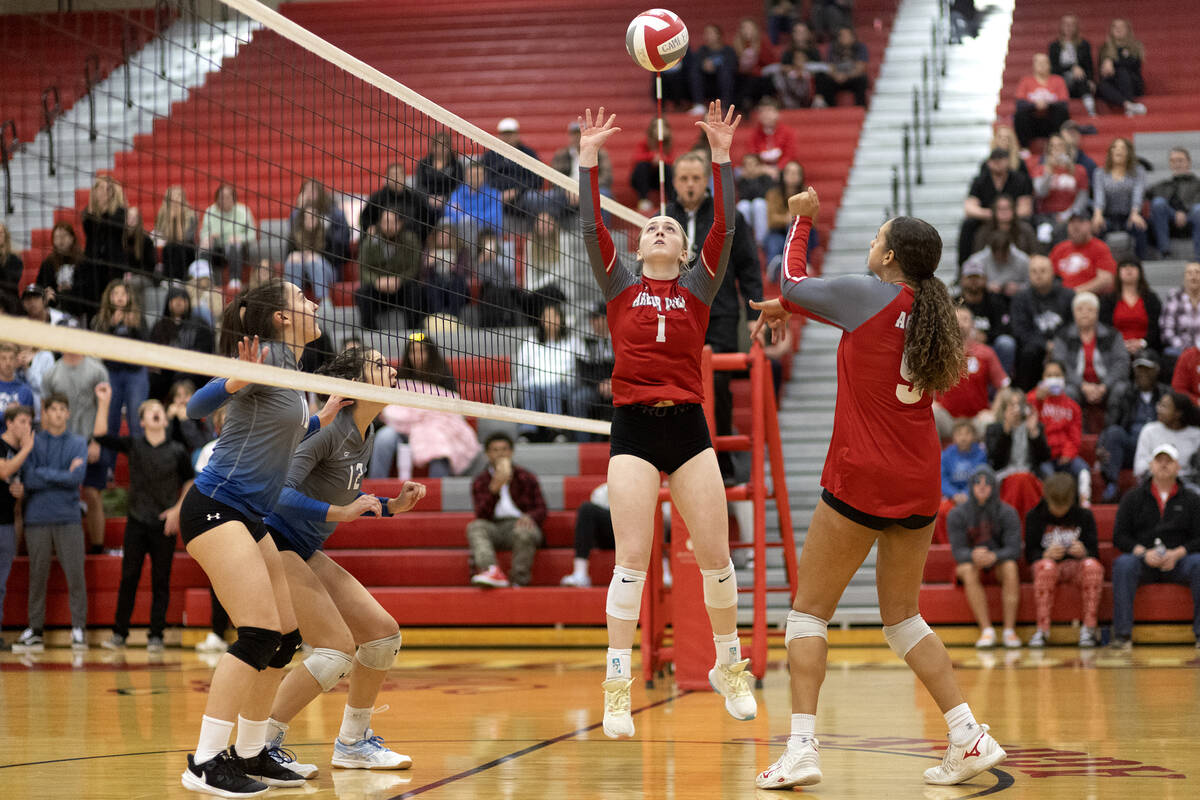 Arbor View’s Sarah Hoofman (1) sets to Willow Watson (9) while Basic’s Martina Mo ...