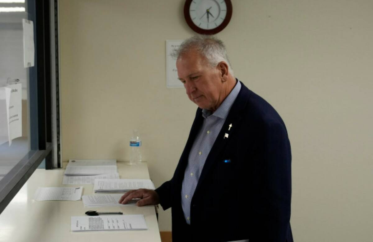 Interim Nye County Clerk Mark Kampf works in an office where early votes are being counted Wedn ...