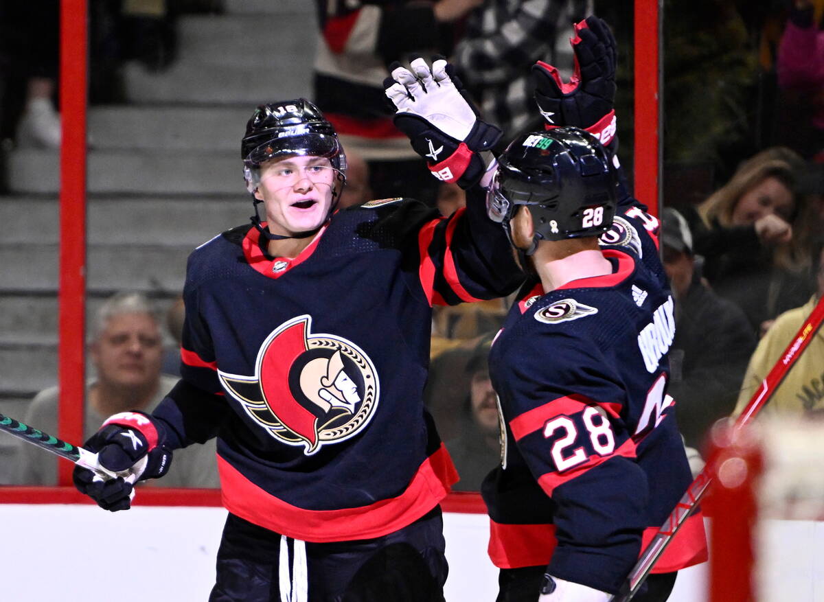 Ottawa Senators left wing Tim Stutzle (18) celebrates after his goal against the Vegas Golden K ...