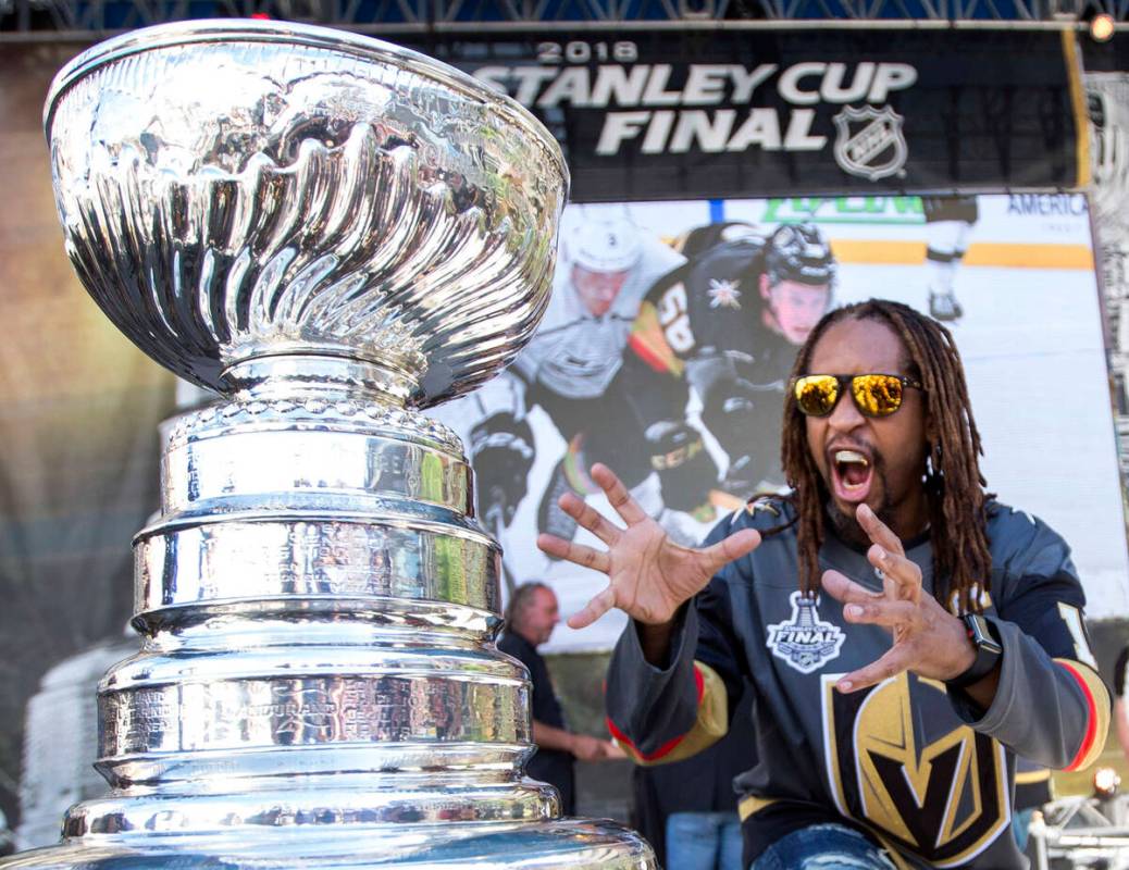 American rapper Lil Jon poses with the Stanley Cup before Game 1 of the NHL hockey Stanley Cup ...