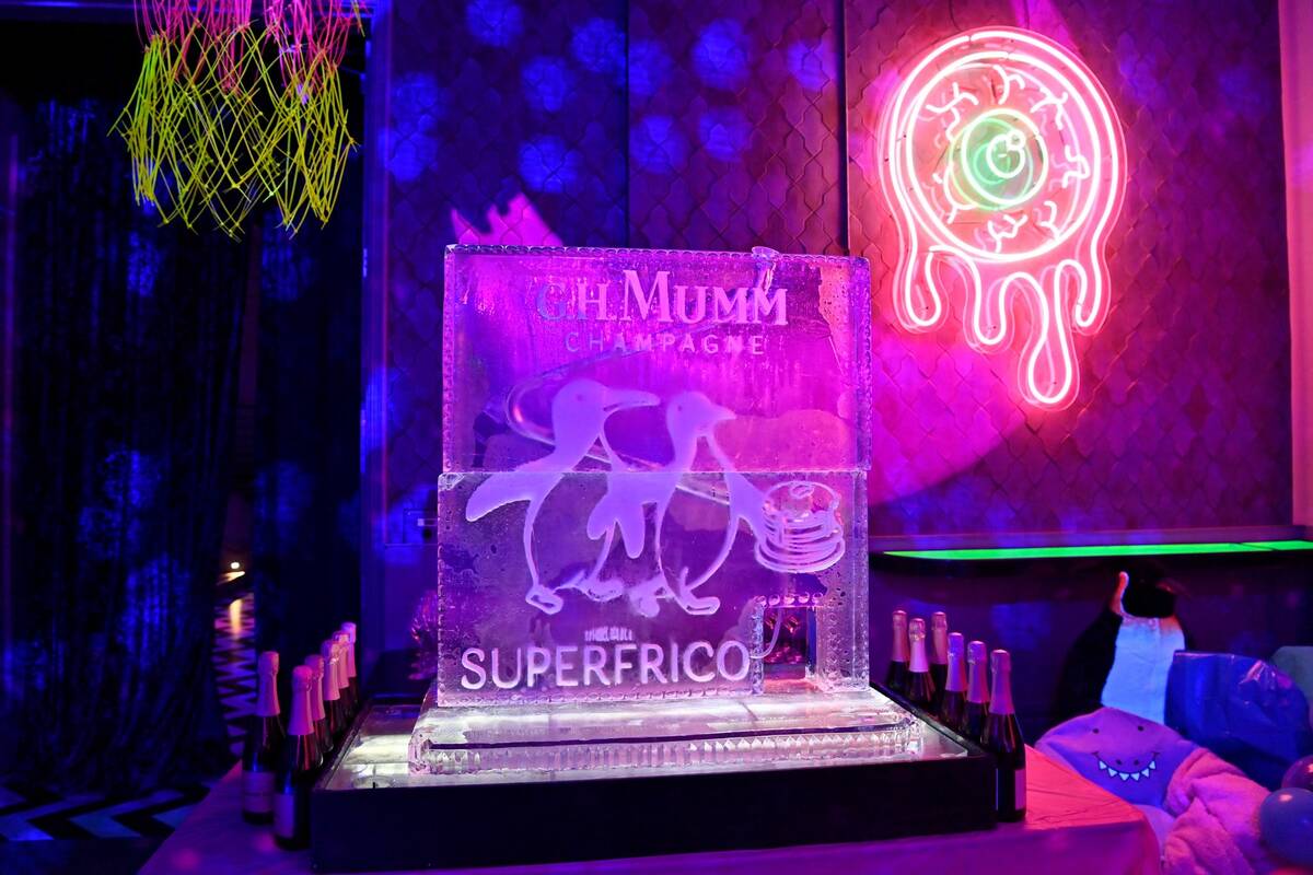 An ice sculpture delivers the message at Superfrico's first anniversary party at the Cosmopolit ...