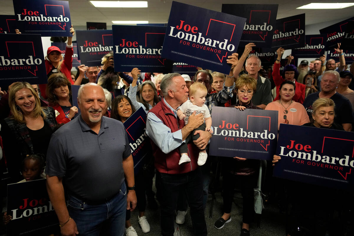 Clark County Sheriff Joe Lombardo, Republican candidate for governor of Nevada, kisses grandson ...