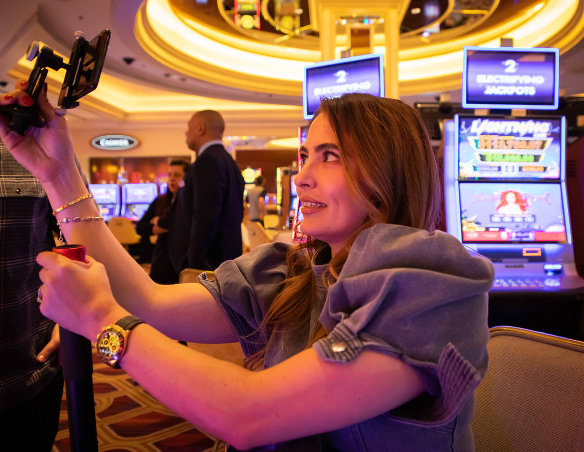 Francine Maric films video footage of herself playing a high limit slot at the Venetian on Frid ...