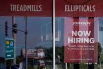 Hiring sign are displayed in Northbrook, Ill., Wednesday, Sept. 21, 2022. (AP Photo/Nam Y. Huh)