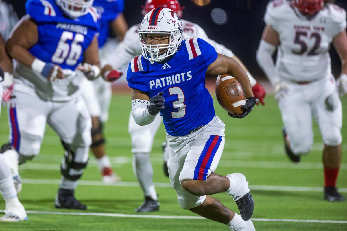 Liberty RB Isaiah Lauofo (3) looks for more yards against the Arbor View defense during the fir ...