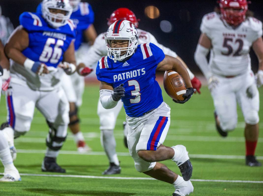 Liberty RB Isaiah Lauofo (3) looks for more yards against the Arbor View defense during the fir ...