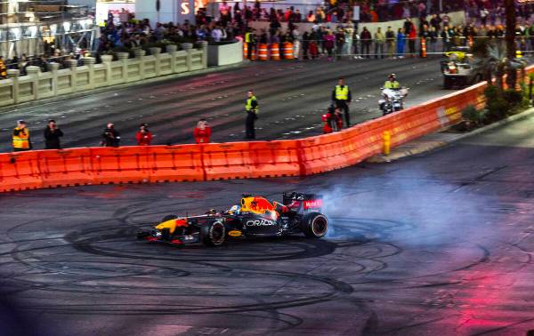 Racer Sergio Pérez turns doughnuts across from the Bellagio while racing up the Strip duri ...