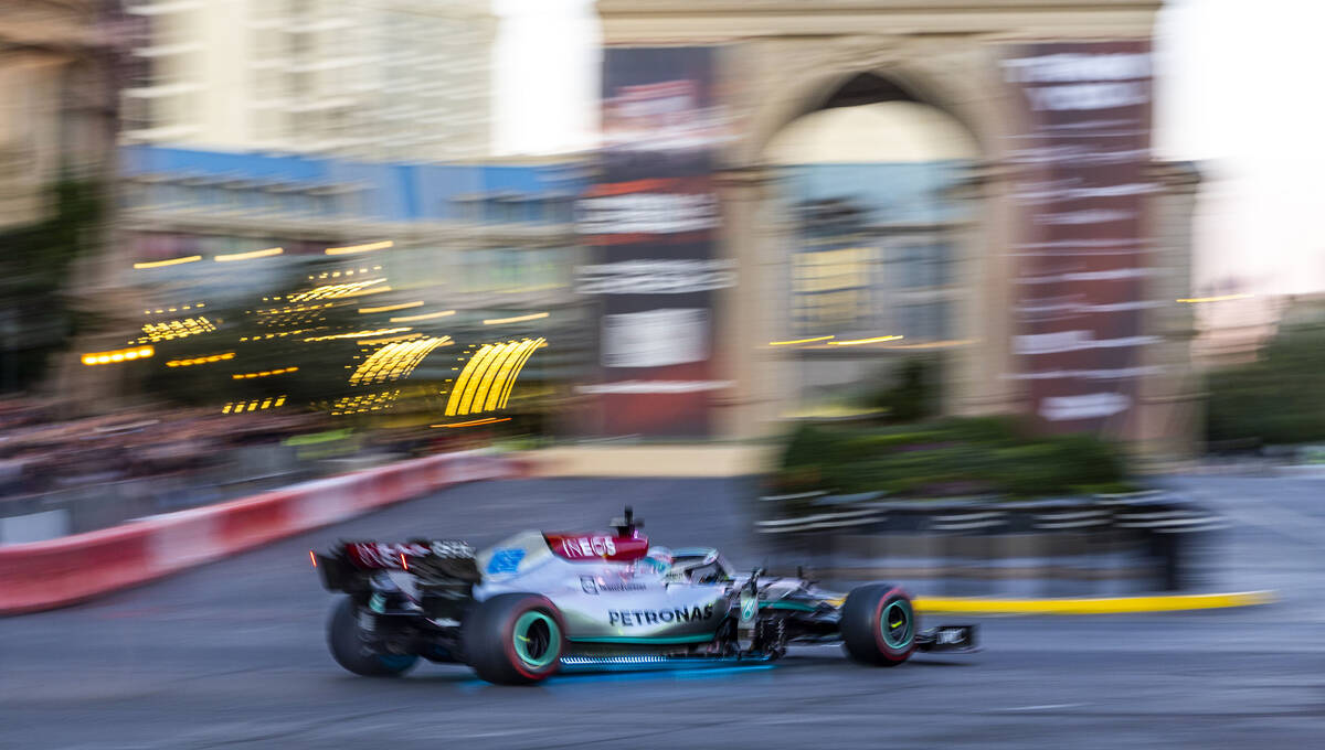 Racer George Russell turns into the Paris while racing down the Strip during the Formula One La ...