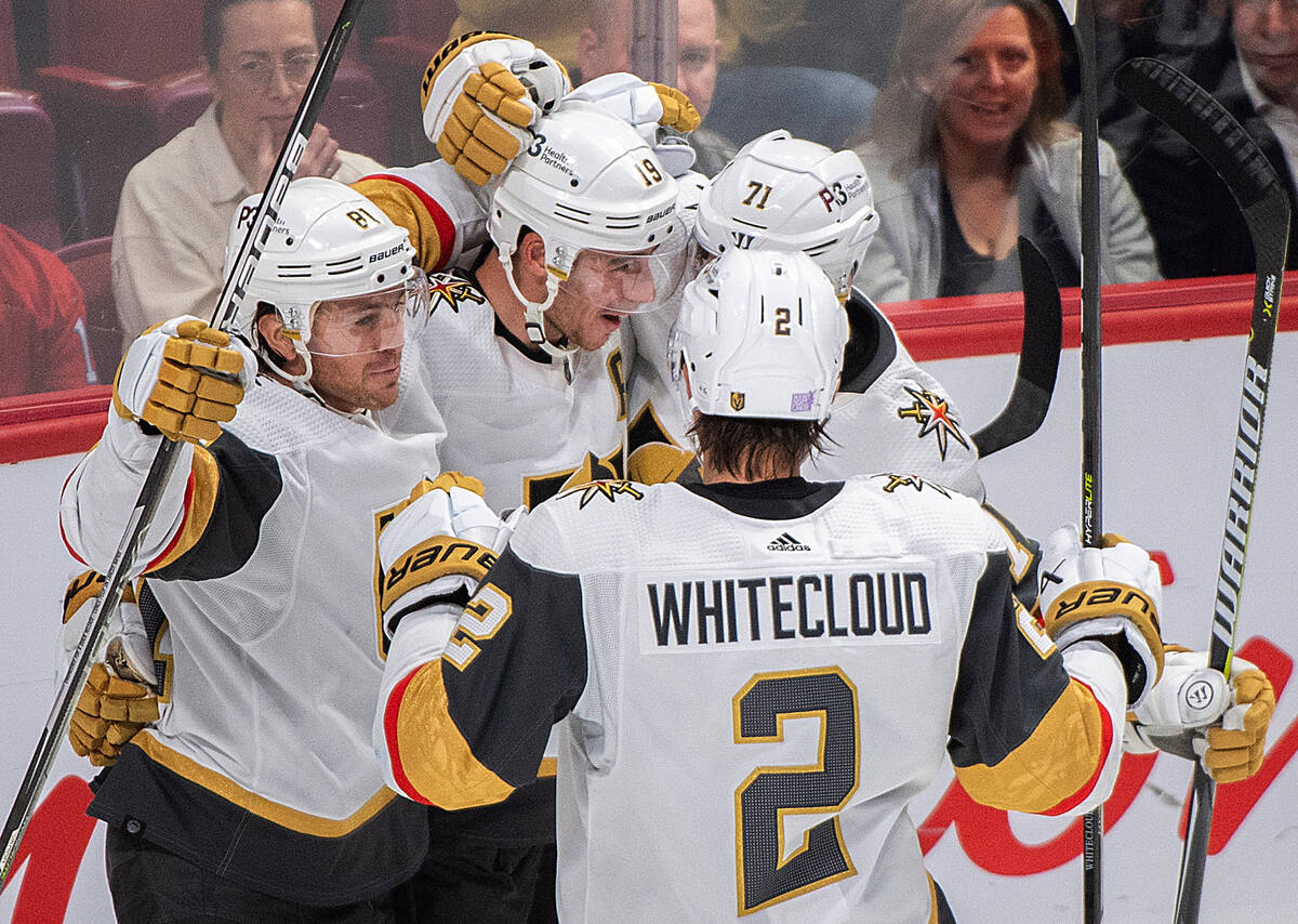 Vegas Golden Knights' Reilly Smith (19) celebrates with teammates after scoring against the Mon ...