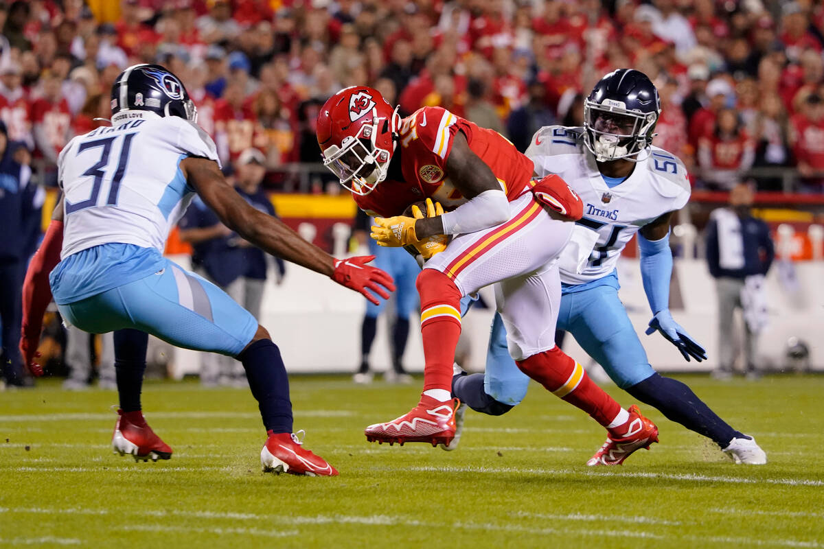 Kansas City Chiefs wide receiver Kadarius Toney (19) catches a pass as Tennessee Titans safety ...