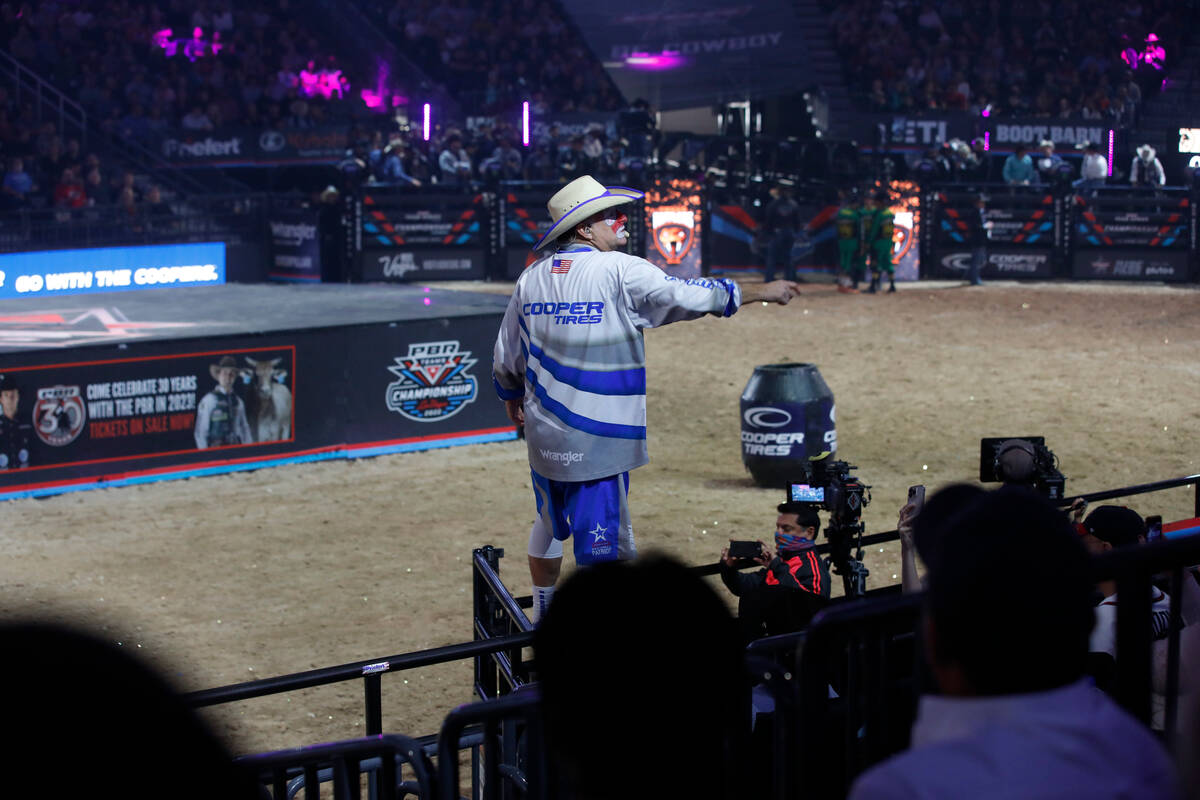Rodeo Clown Flint Rasmussen sings to the audience during the Pro Bull Riders team championship ...