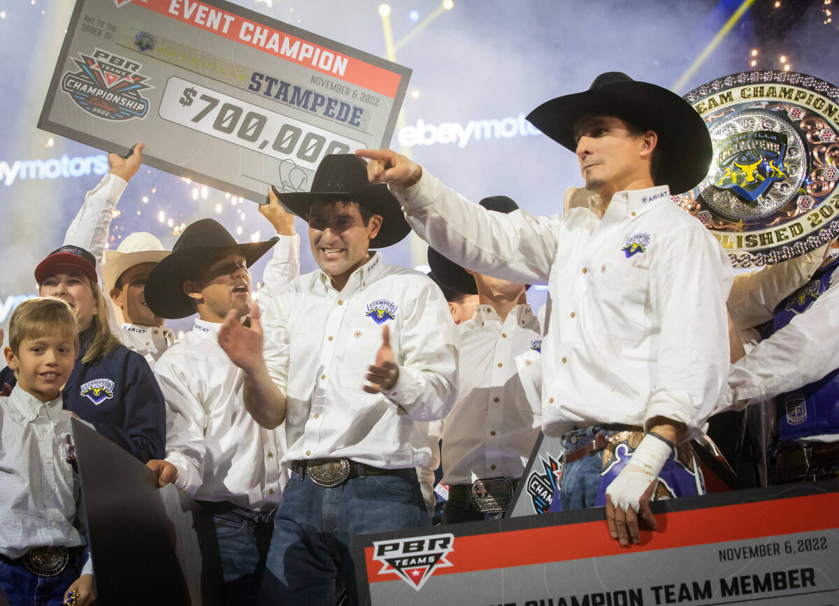 The Nashville Stampede team members celebrate their victory at the Pro Bull Riders team champio ...
