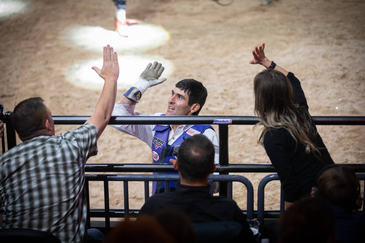 Nashville Stampede’s Silvano Alves high fives supporters after his run during the Pro Bu ...