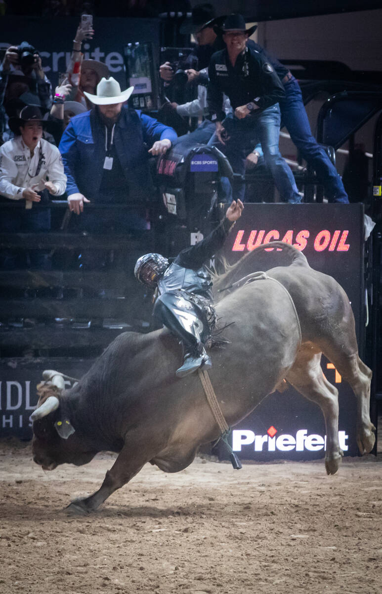 Arizona Ridge Riders’ Keyshawn Whitehorse rides Whiplash during the Pro Bull Riders team ...