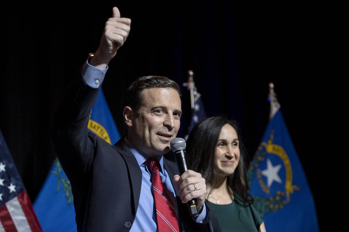 Nevada Republican Senate candidate Senate Adam Laxalt, standing next to his wife Jaime Laxalt, ...