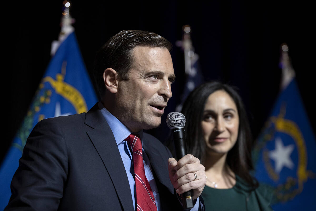 Nevada Republican Senate candidate Senate Adam Laxalt, standing next to his wife Jaime Laxalt, ...