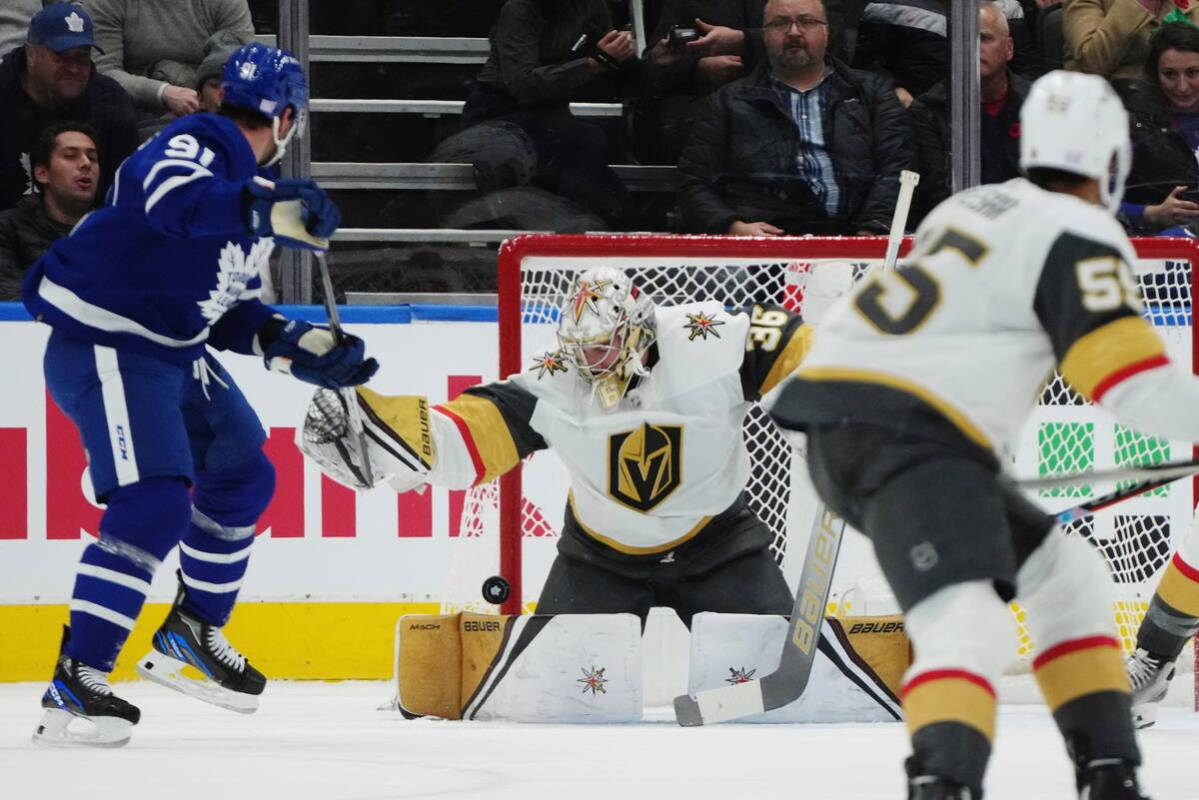 Vegas Golden Knights goaltender Logan Thompson (36) makes a save against Toronto Maple Leafs fo ...