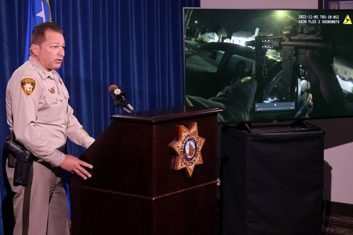 Assistant Sheriff Lazaro Chavez shows body worn camera video during a news conference at Metrop ...