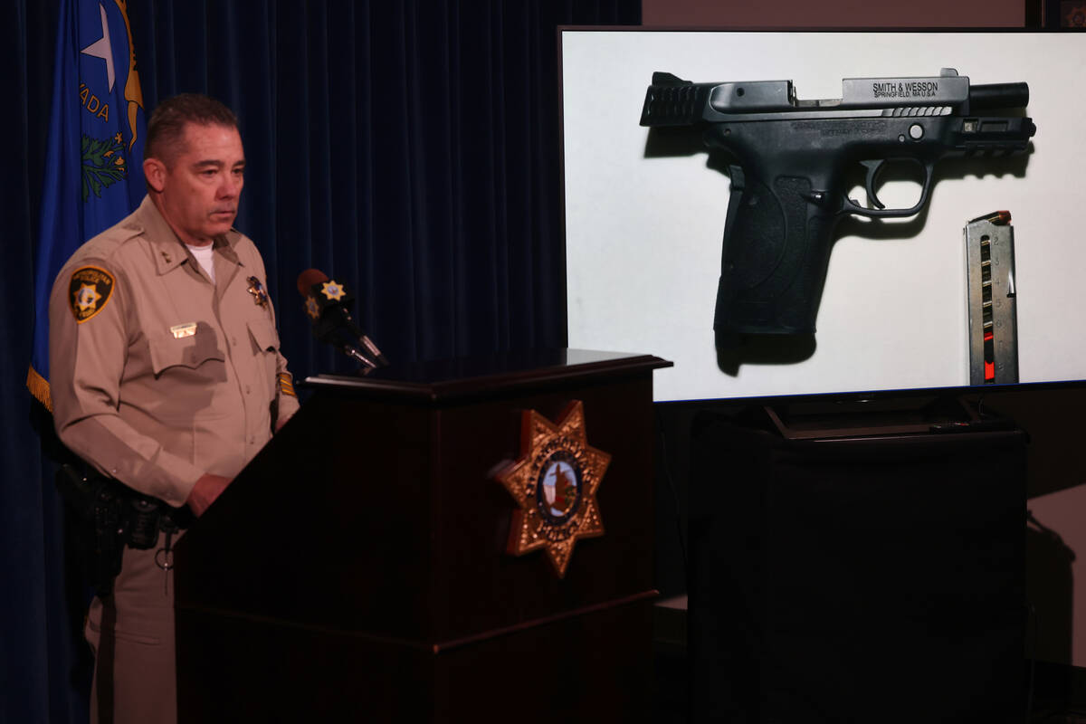 Assistant Sheriff Andrew Walsh shows a photo of a gun belonging to Jose Cabrera Hernandez durin ...