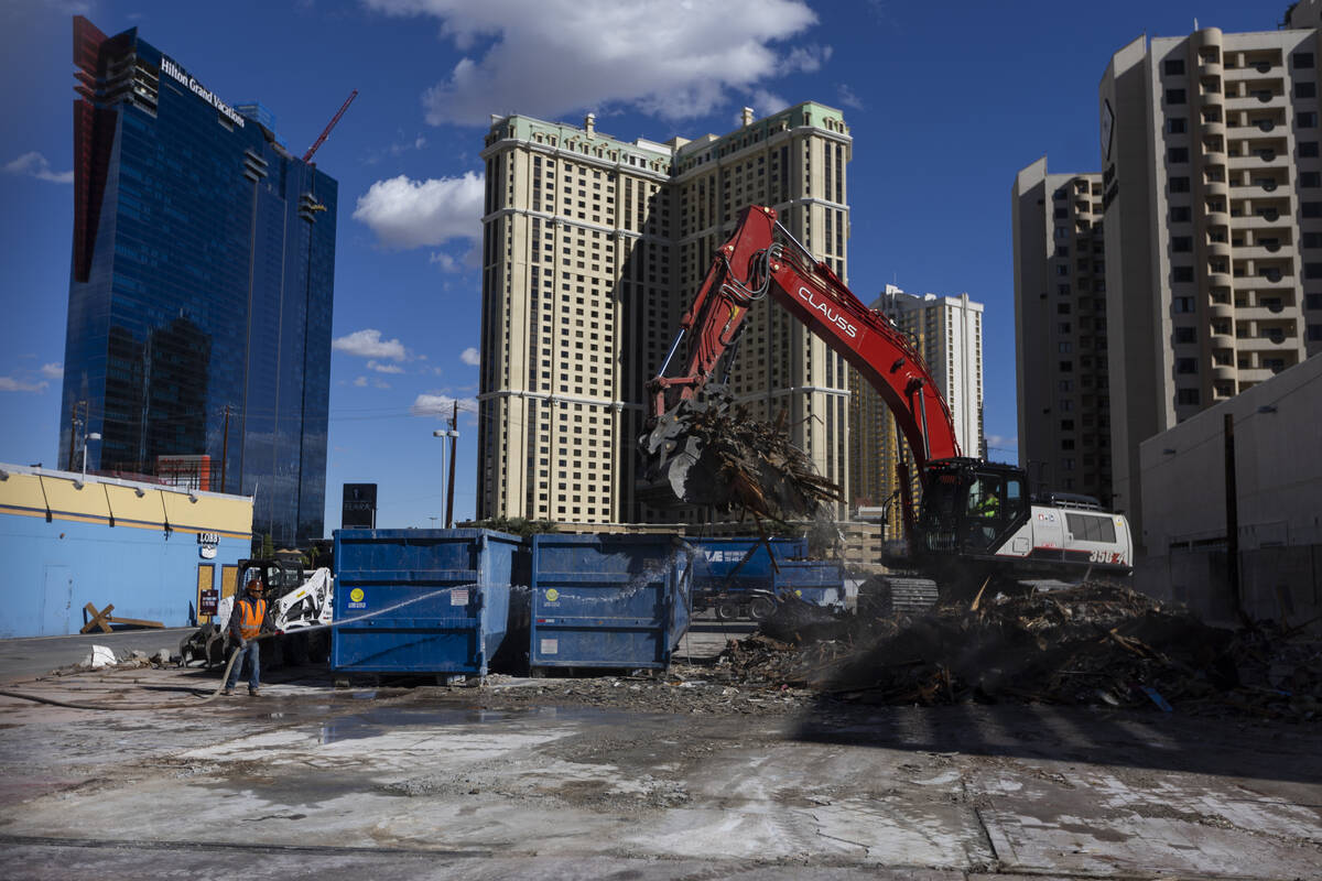 Demolition crews clean up the site of what used to be the Travelodge motel on the Strip, 3735 L ...