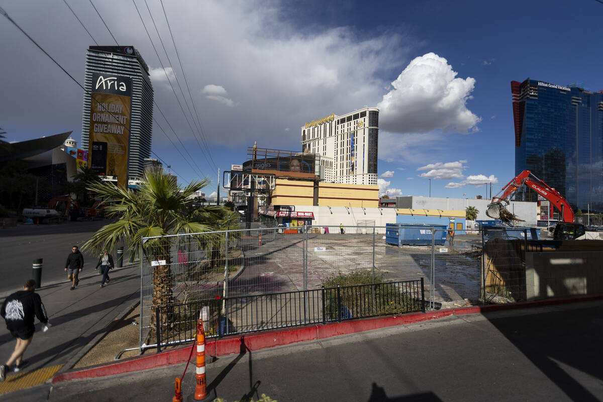 Demolition crews clean up the site of what used to be the Travelodge motel on the Strip, 3735 L ...