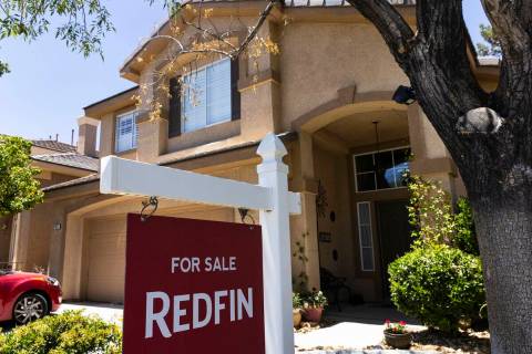 Redfin's for sale sign is posted outside a single-family house in Las Vegas on Wednesday, June ...
