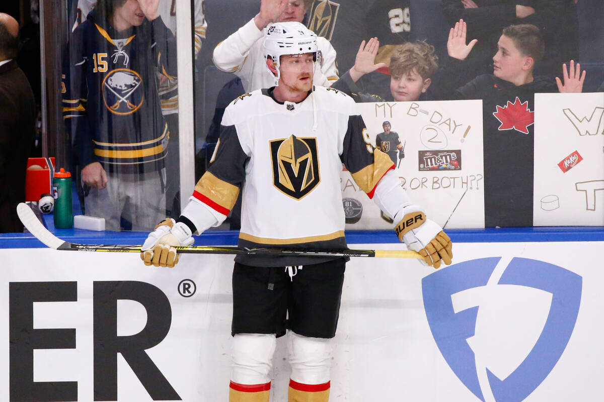 Buffalo Sabres right wing Alex Tuch (89) checks Vegas Golden Knights defenseman Shea Theodore ( ...