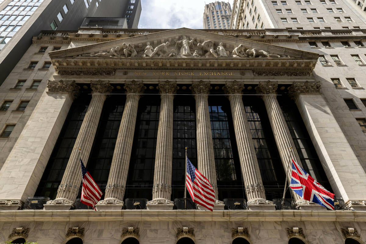 FILE - Statues adorn the facade of the New York Stock Exchange, Tuesday, Sept. 13, 2022, in New ...