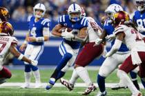 Indianapolis Colts running back Jonathan Taylor (28) runs up the middle during an NFL football ...