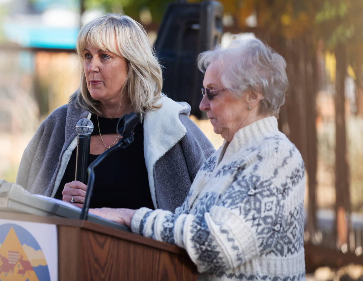 Colleen Herbst, left, speaks about her family history as Patricia Reisbeck, right, listens duri ...