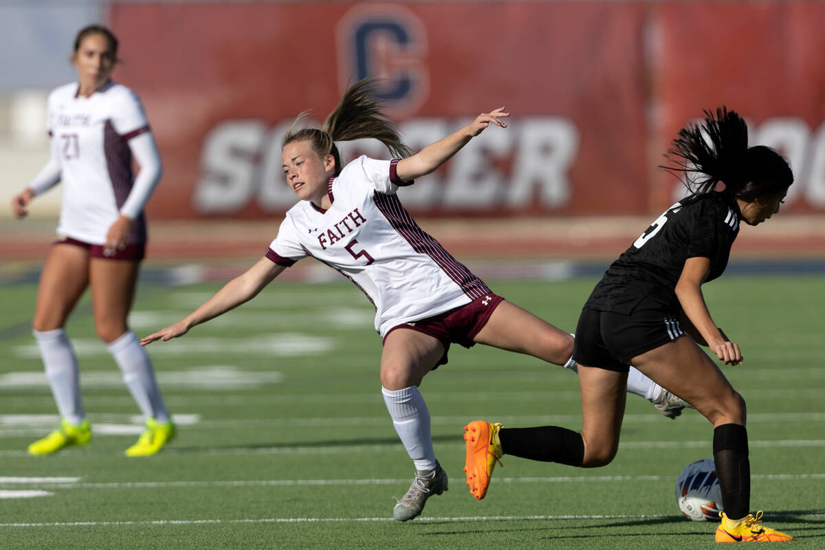 Faith Lutheran’s McKenna Beckett (5) takes a fall as Galena’s Genesis Rodriguez V ...