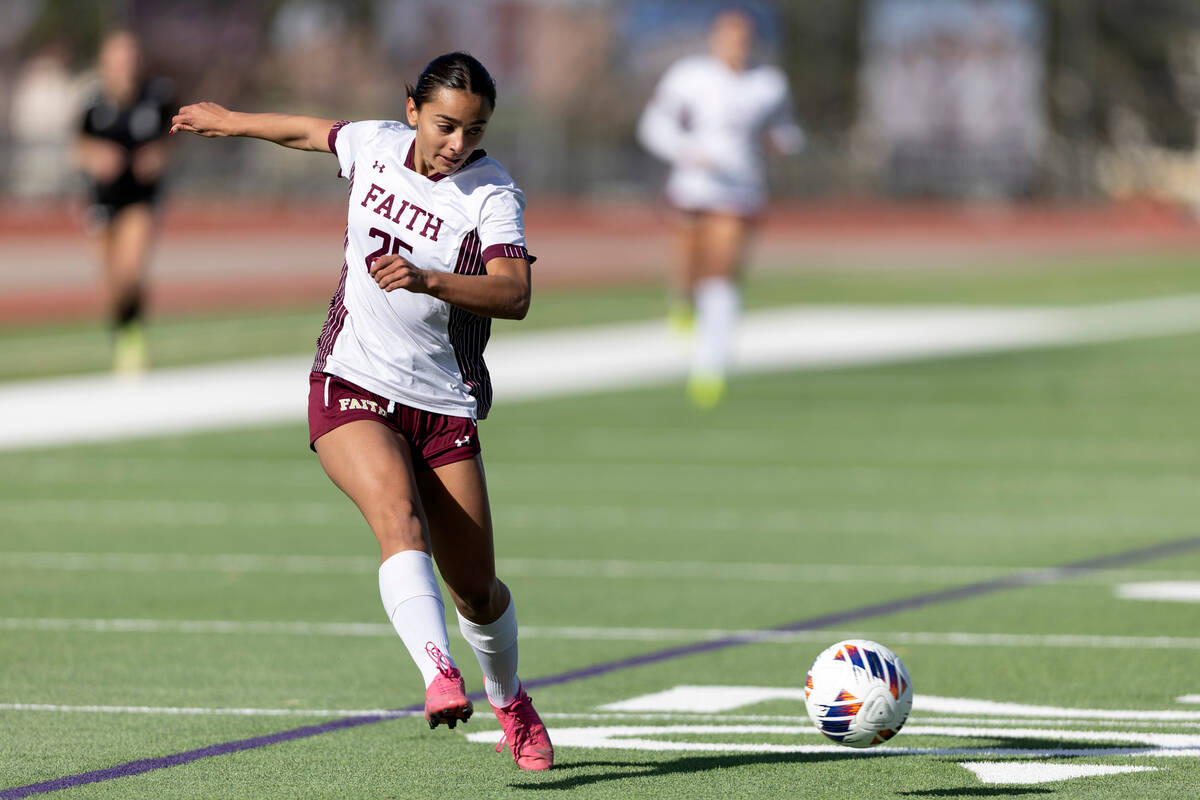 Faith Lutheran’s Riley Renteria (25) attempts to score during a Class 5A girls high scho ...