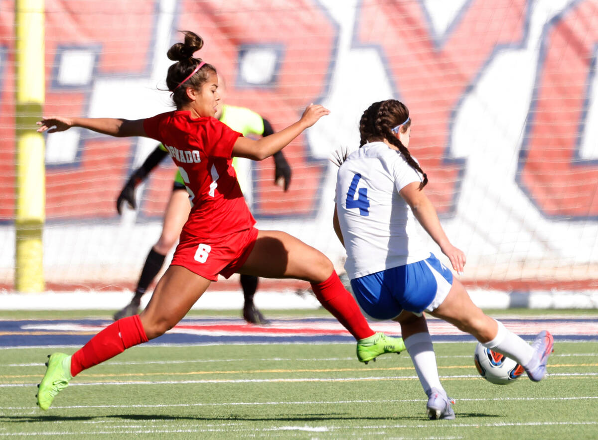 Coronado High's Misha Yap (8) tries to block McQueen's High Allysa Allan's (4) ball during the ...