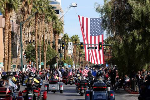 Multiple motorcycle veterans groups ride in the Veterans Day parade on Fourth Street in downtow ...