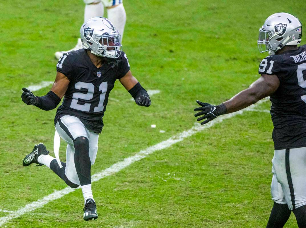 Raiders cornerback Amik Robertson (21) celebrates his big hit with an Indianapolis Colts wide r ...