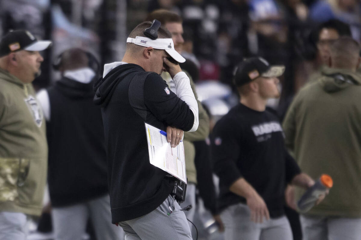 Raiders head coach Josh McDaniels reacts after a play during the second half of an NFL game aga ...