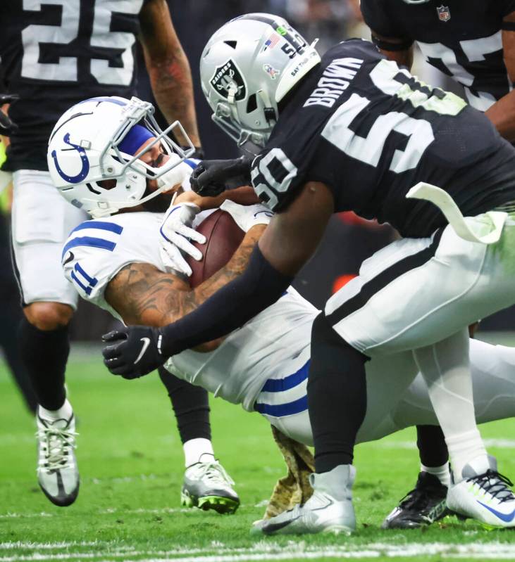 Raiders linebacker Jayon Brown (50) makes the stop against Indianapolis Colts wide receiver Mic ...