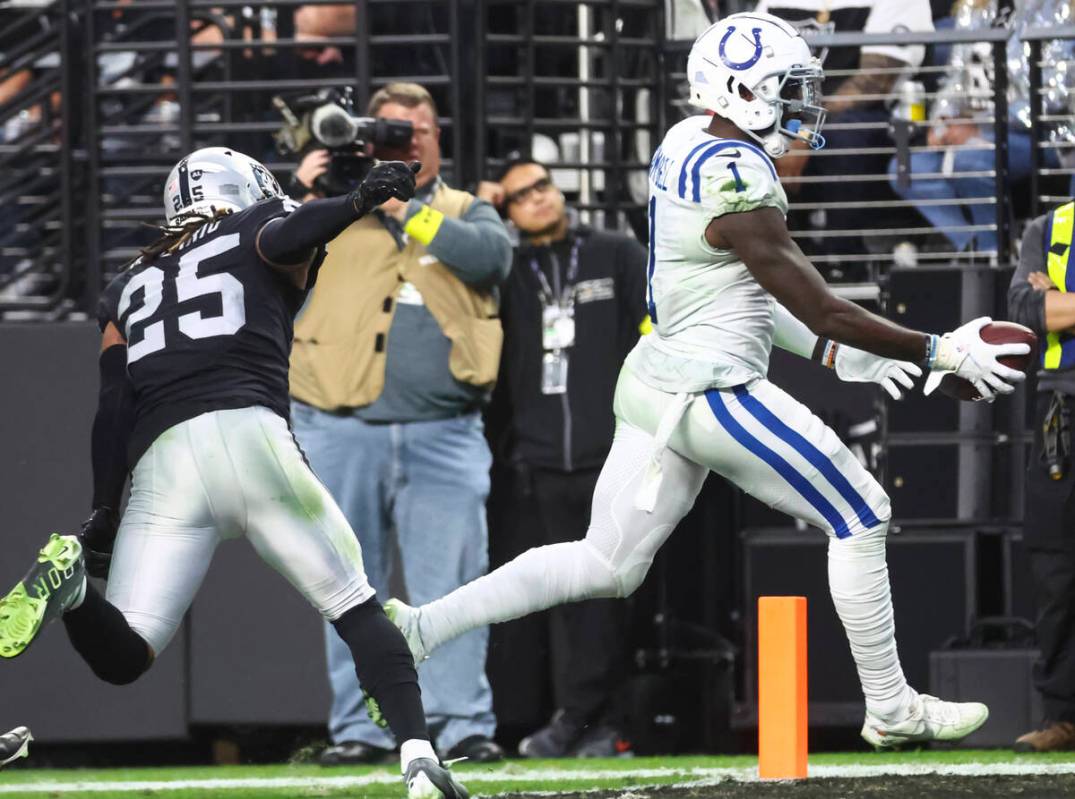 Indianapolis Colts wide receiver Parris Campbell (1) scores a touchdown past Raiders safety Tre ...