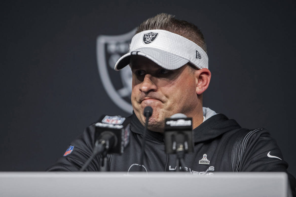 Raiders head coach Josh McDaniels frowns during a post-game news conference following a 25-20 l ...