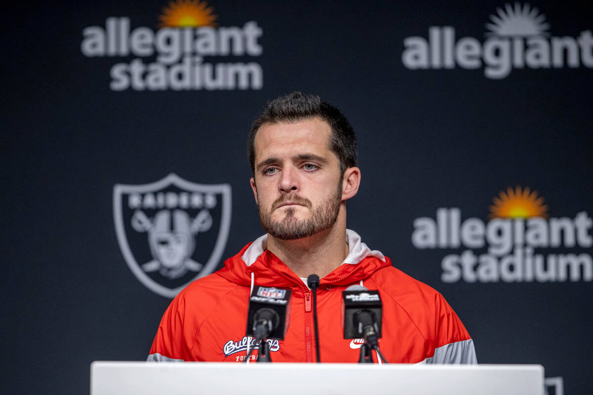 Raiders quarterback Derek Carr takes question during an NFL post-game news conference following ...