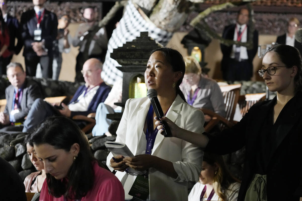 A reporter asks President Joe Biden a question during a news conference on the sidelines of the ...