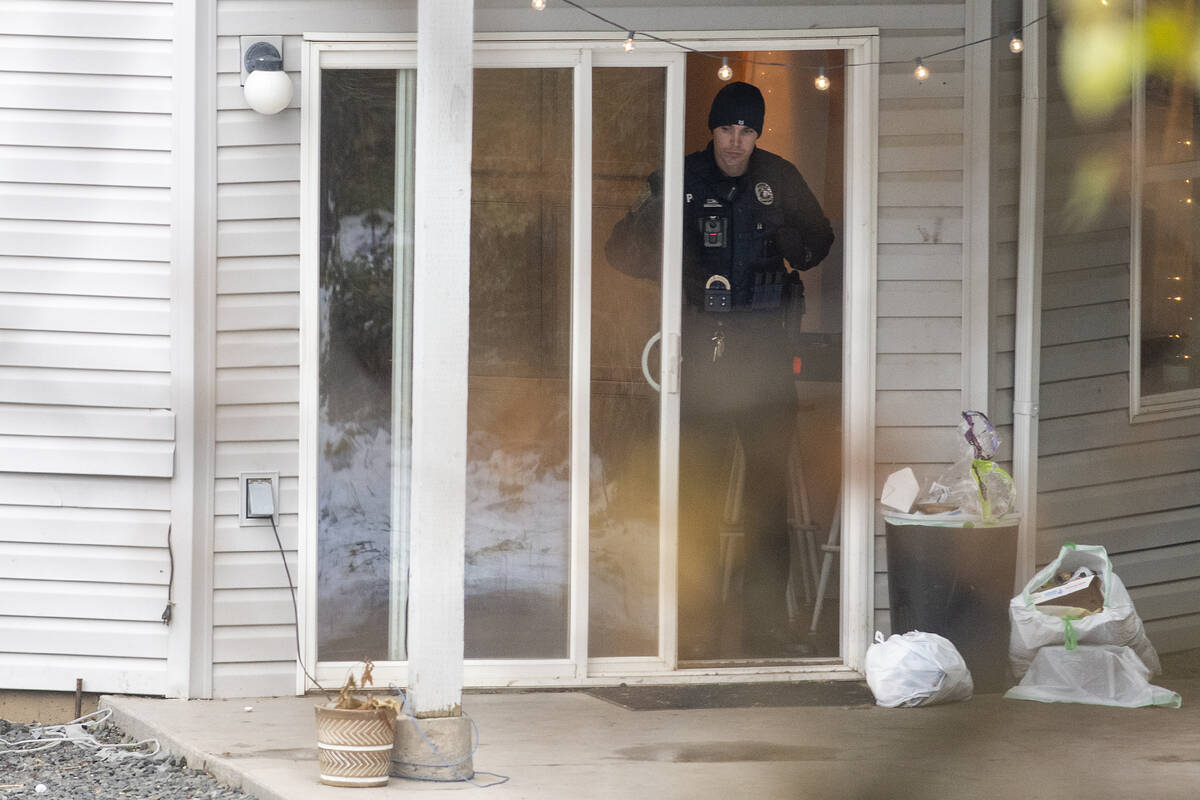 Officers investigate a homicide at an apartment complex south of the University of Idaho campus ...