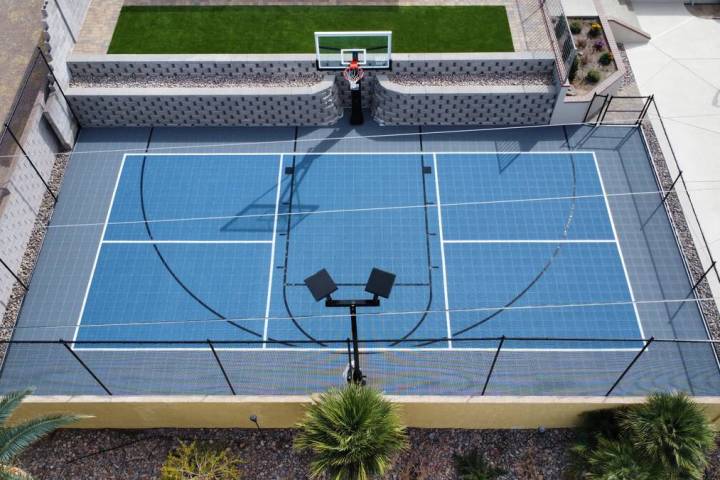 This versatile basketball court can be turned into a pickleball court with the addition of a ne ...