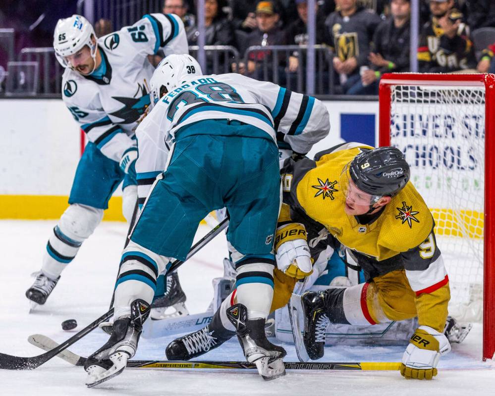 Golden Knights right wing Keegan Kolesar (55) eyes the puck getting away as San Jose Sharks goa ...