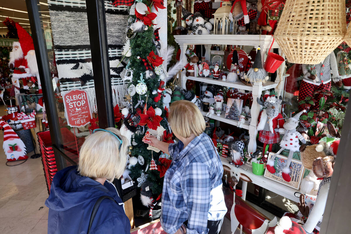 Karen Buchanan, left, and Dee Wade, both of Henderson, shop at Santa’s Wrap home decor and fu ...