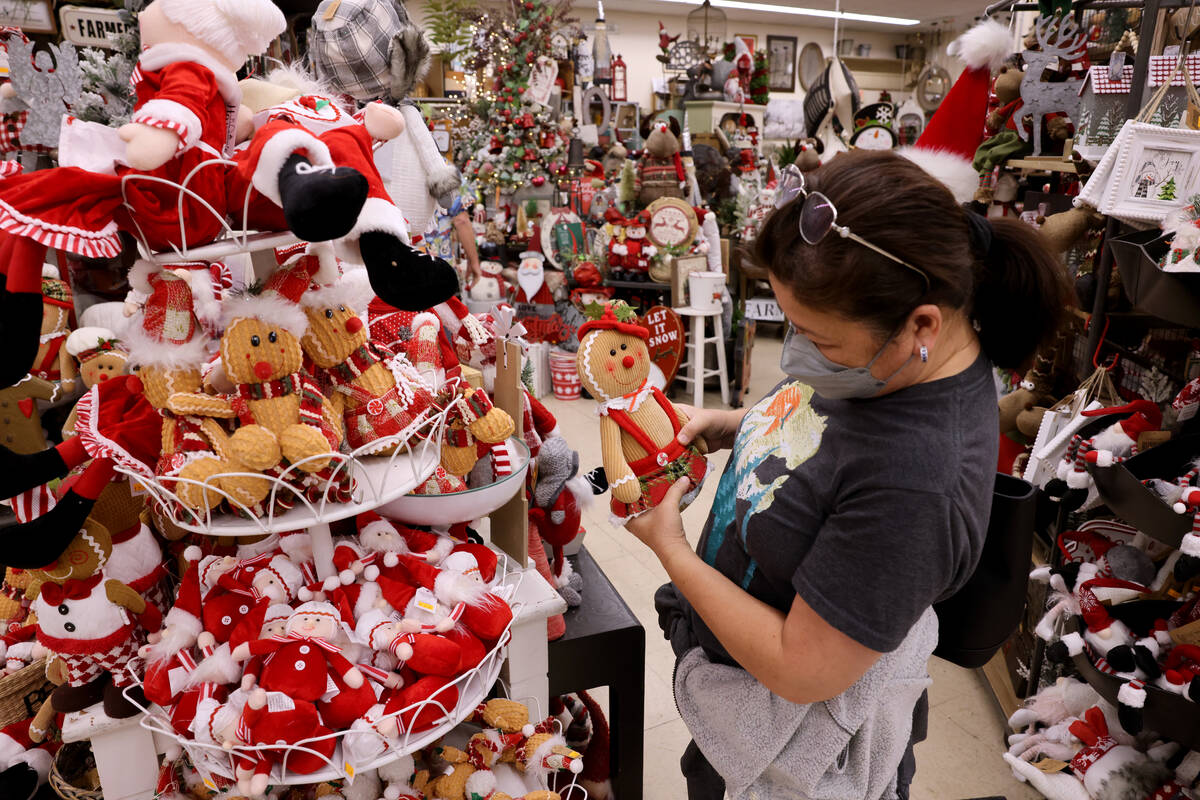 Cristina Manzano of Los Angeles shops at Santa’s Wrap home decor and furniture store in Las V ...