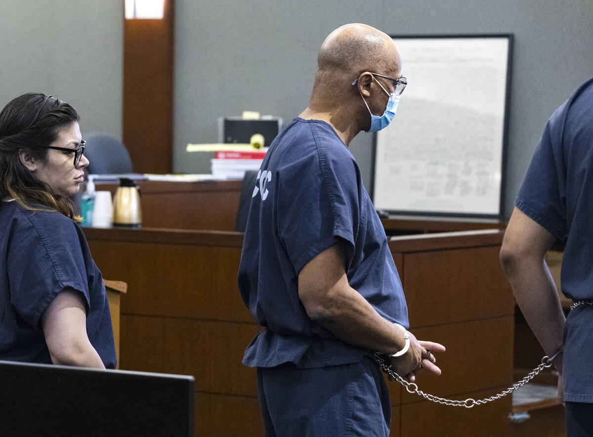 Wendell Melton, right, who was found guilty of killing his 14-year-old son, is led into the cou ...
